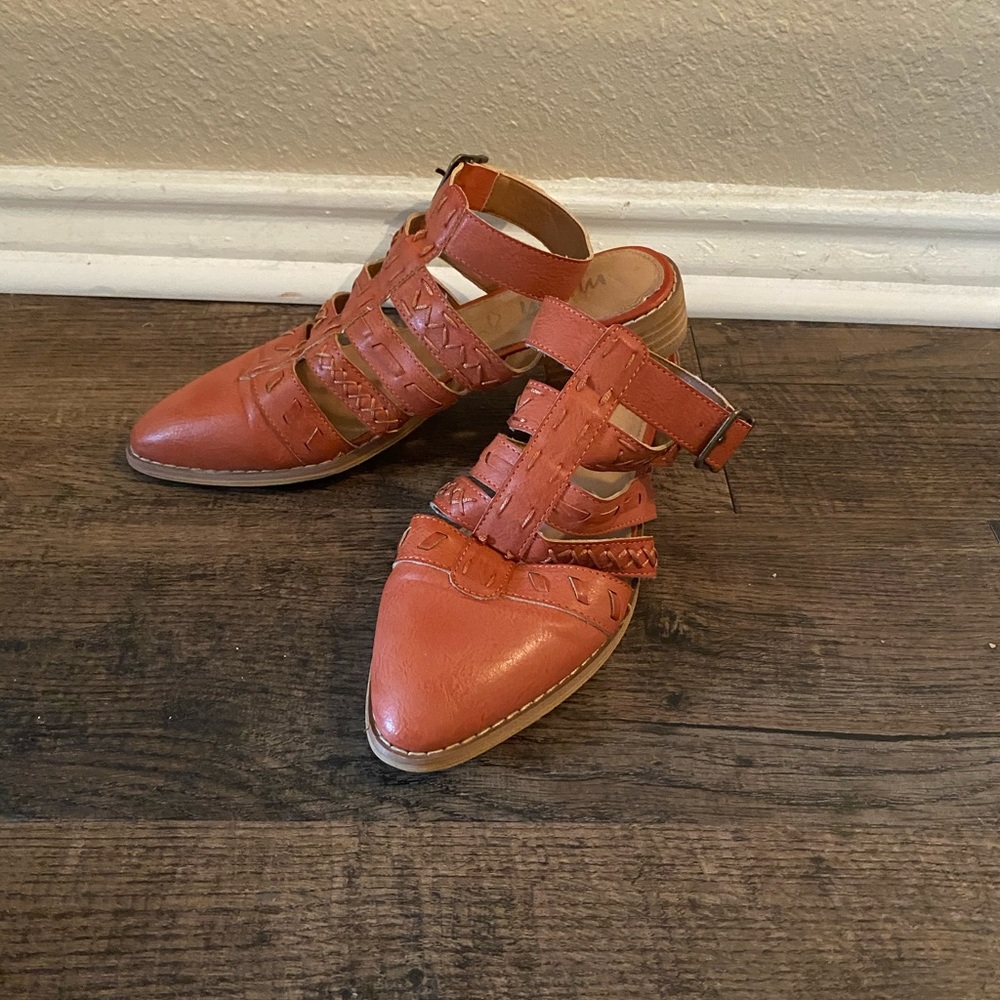 Orange / red colored sandals with ankle strap!